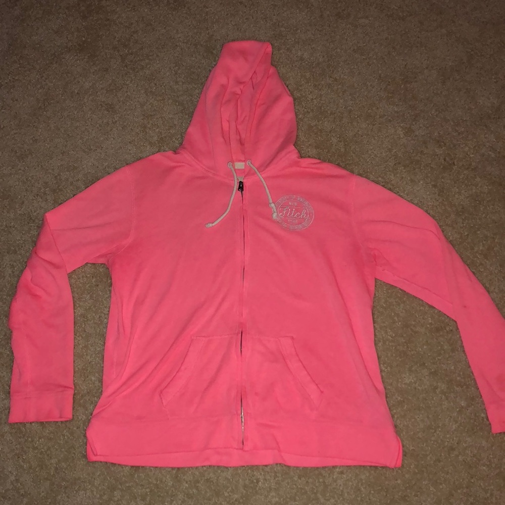 a zip up sweater
